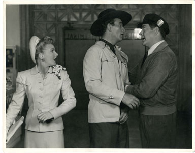 JOHN WAYNE JEAN ARTHUR PHOTO from A LADY TAKES A CHANCE