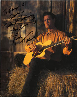 RANDY TRAVIS AUTOGRAPH on PORTRAIT PHOTOGRAPH