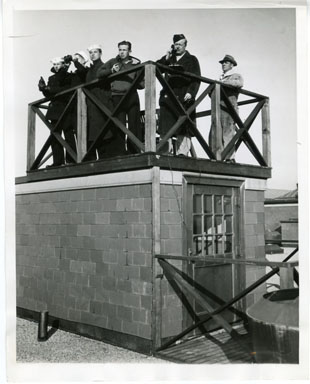 NEWS PHOTO: WWII AIR RAID WARDENS TAKE UP POST (1941)