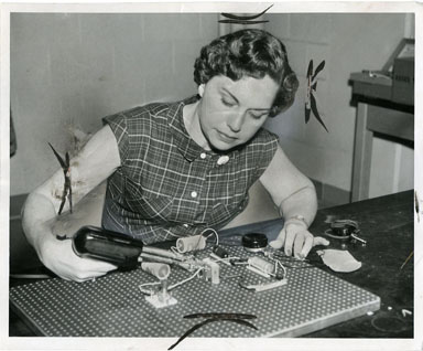 NEWS PHOTO: SCIENCE TEACHER ASSEMBLES GEIGER COUNTER 1957